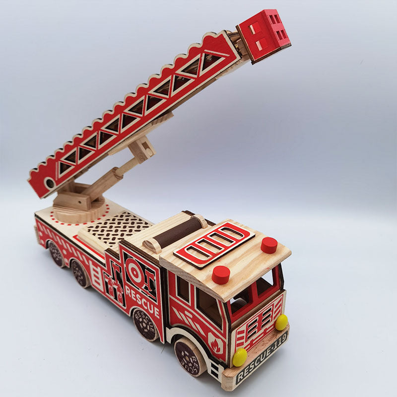 Wooden toy fire truck with red ladder on a light gray background