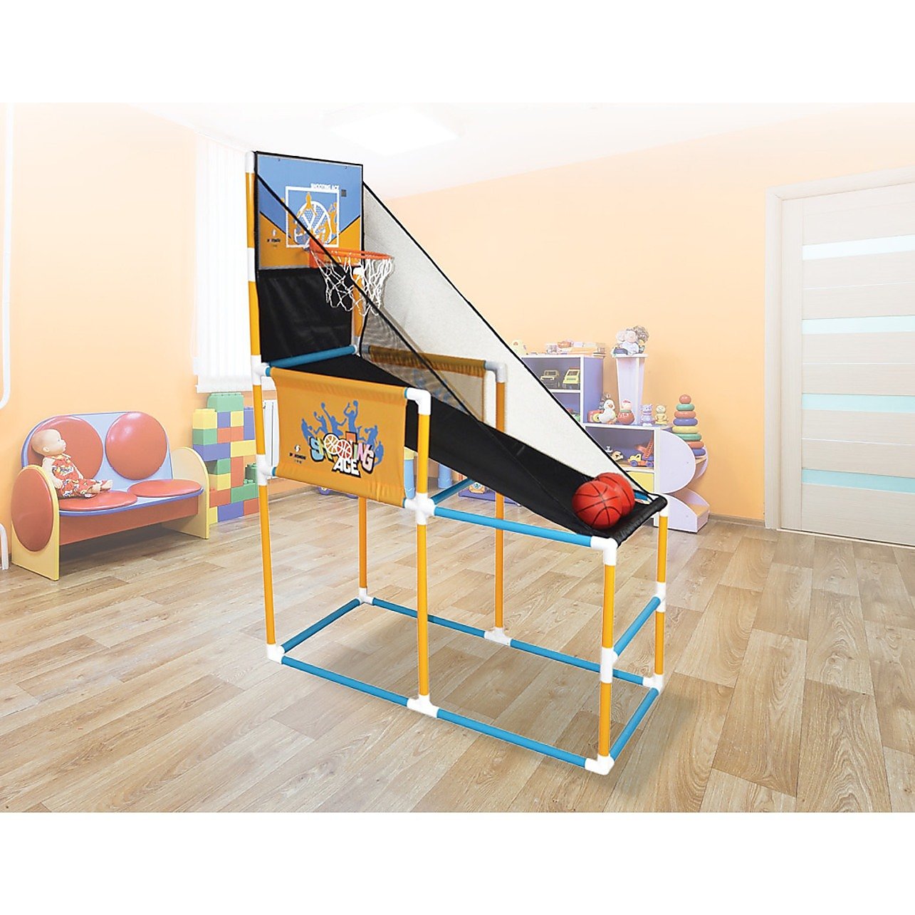 Children's basketball hoop set with toy basketball on a wooden floor.