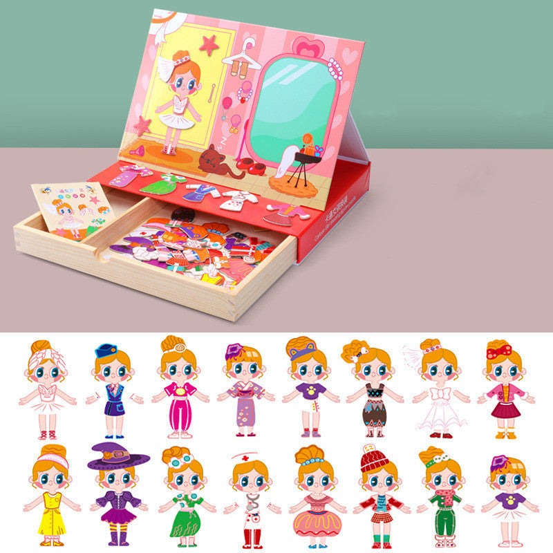 Children's dress-up toy set with dolls and accessories in a box on a pink background.