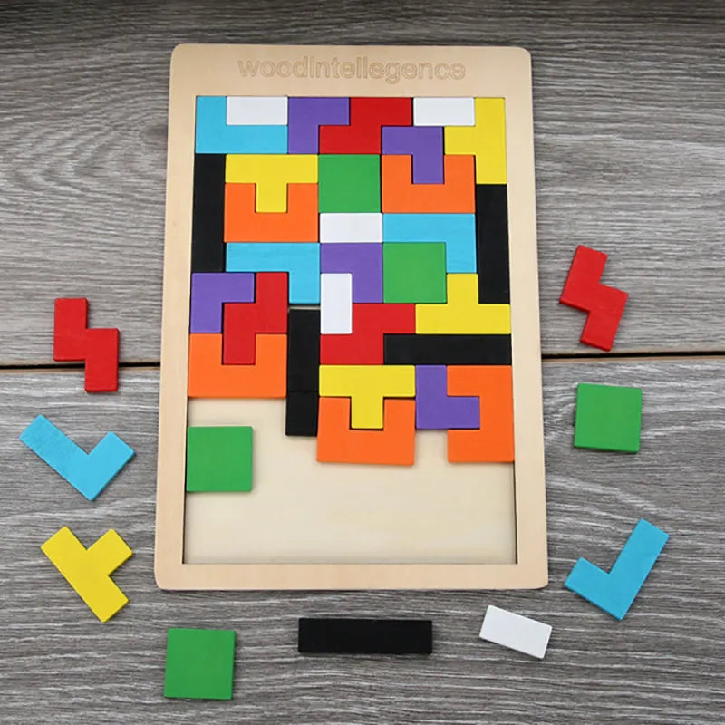 Colorful wooden puzzle on a wooden surface with 'woodintelligence' branding.