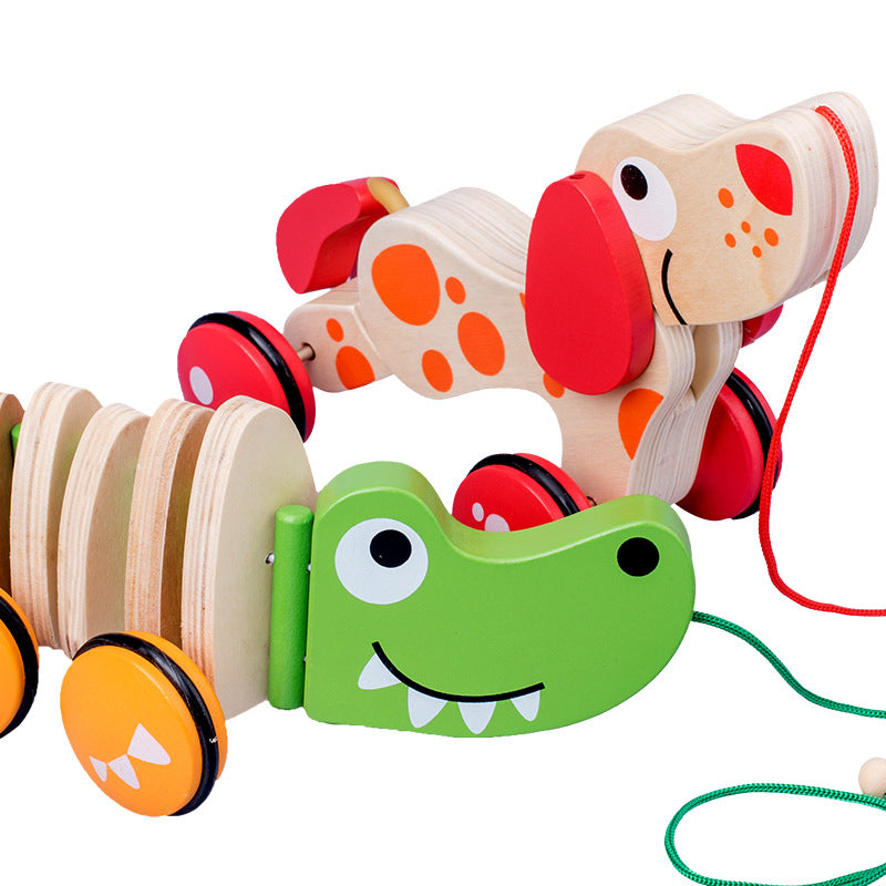 Wooden toy with colorful wheels and a pull string on a white background