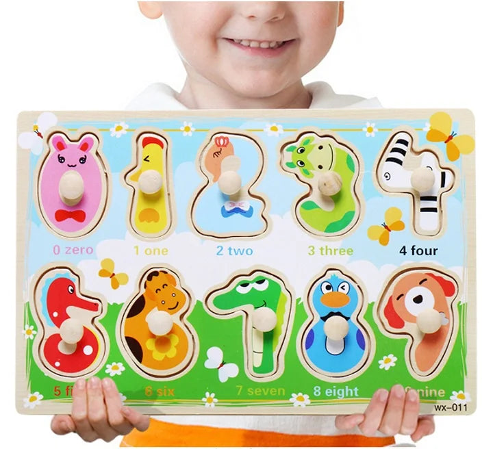 Child holding a colorful wooden puzzle with numbers and animals