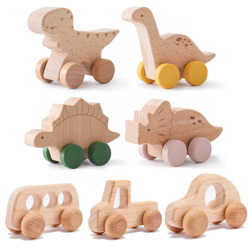 Set of wooden animal toys with wheels on a white background
