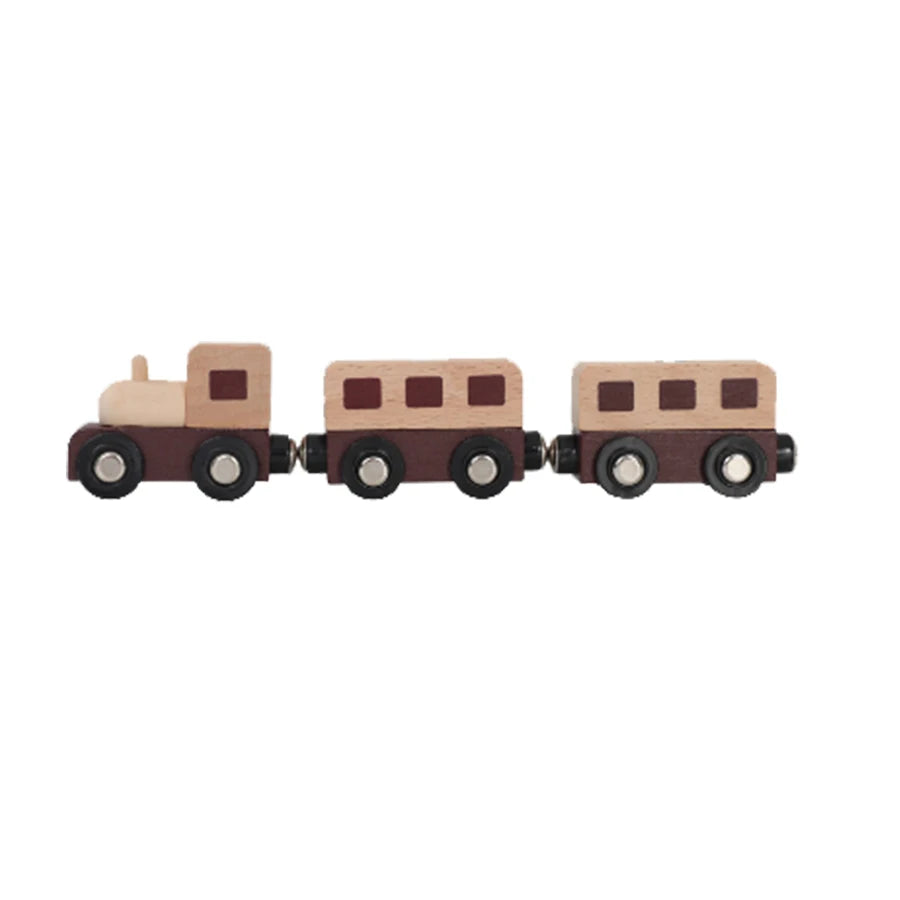 Wooden toy train set on a white background
