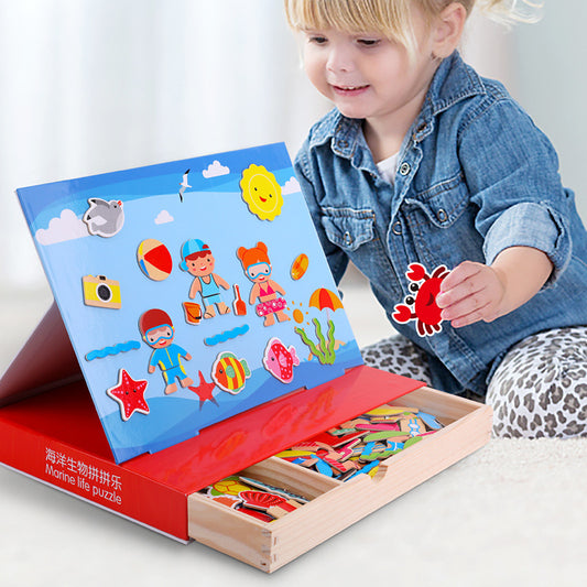 Child playing with a marine life puzzle set on a white background