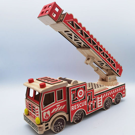 Wooden toy fire truck with a ladder on a light blue background