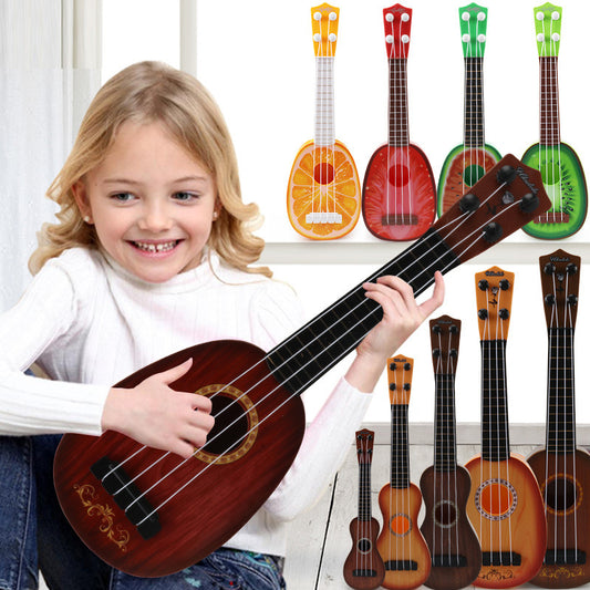 Child holding a ukulele with colorful ukuleles in the background