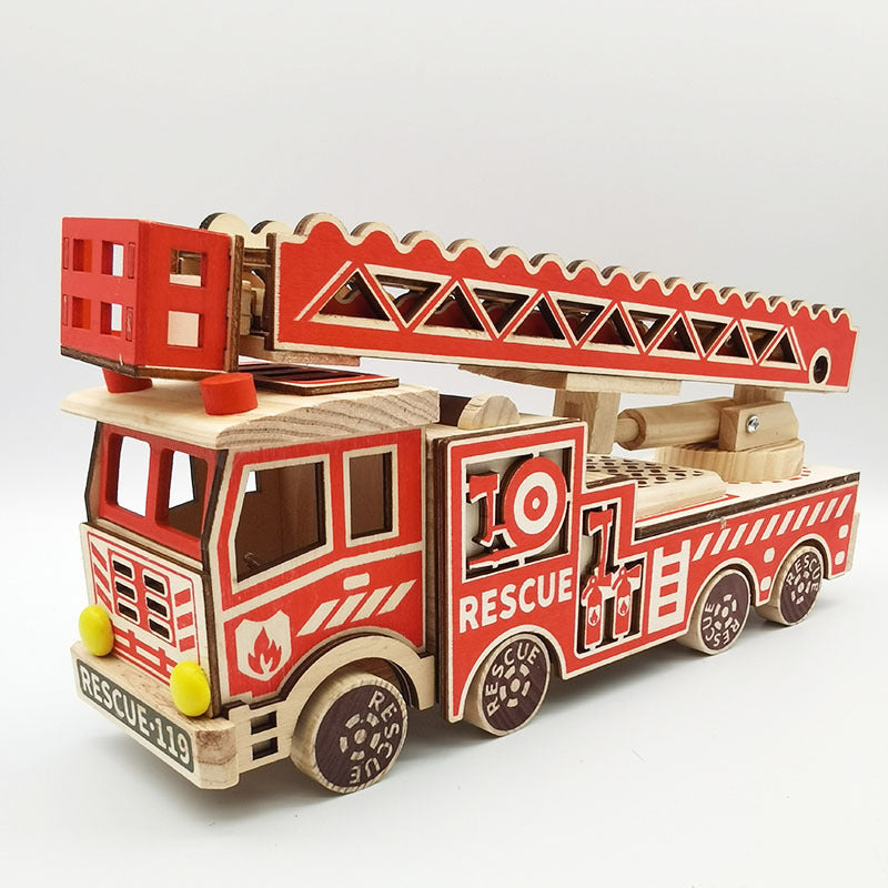 Wooden toy fire truck with red ladder on a white background