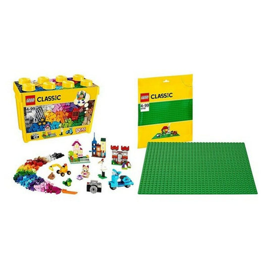 LEGO Classic set with building blocks, box, and green baseplate on a white background