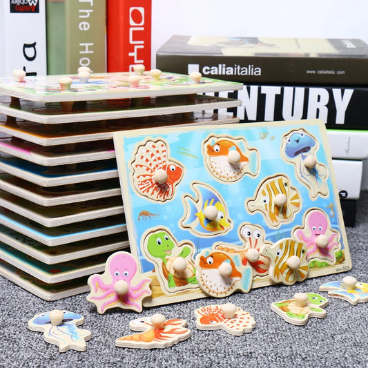 Children's wooden puzzle with sea-themed figures on a gray surface.