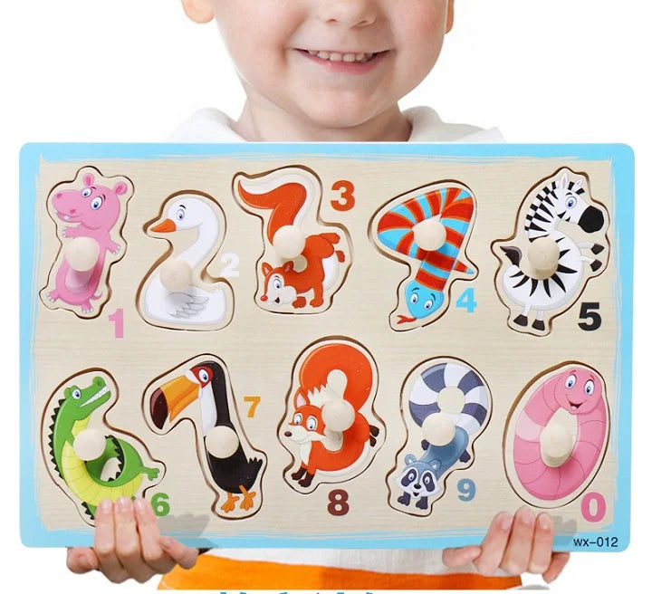 Child holding a wooden puzzle with numbers and animals