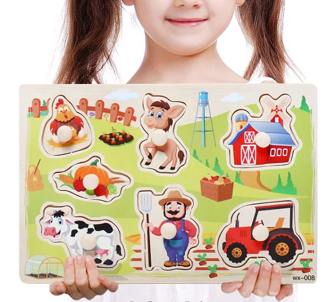 Child holding a farm-themed wooden puzzle with various farm animals and objects.