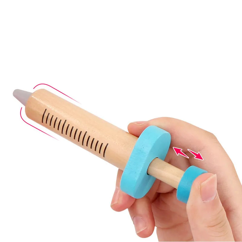 Hand holding a wooden tool with a blue handle on a white background