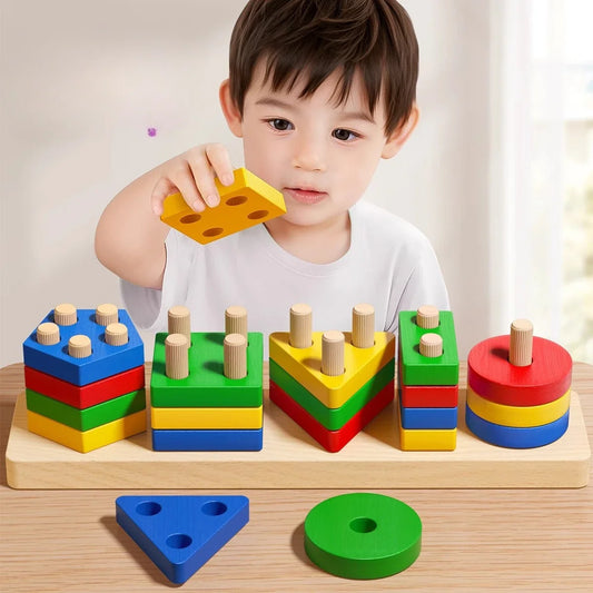 Child playing with colorful geometric shape sorting toy on a wooden board.