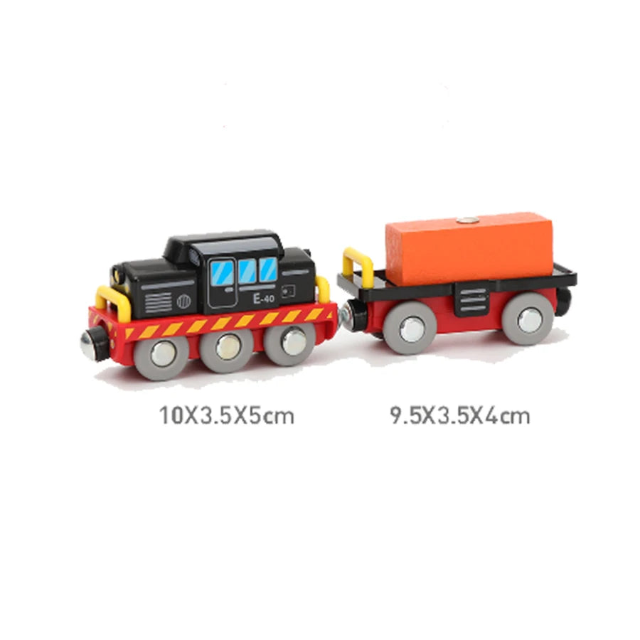 Toy train set with a black engine and orange cargo car on a white background