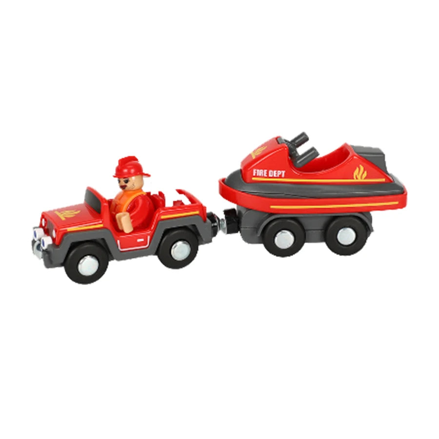 Toy fire truck with a smaller vehicle attached on a white background