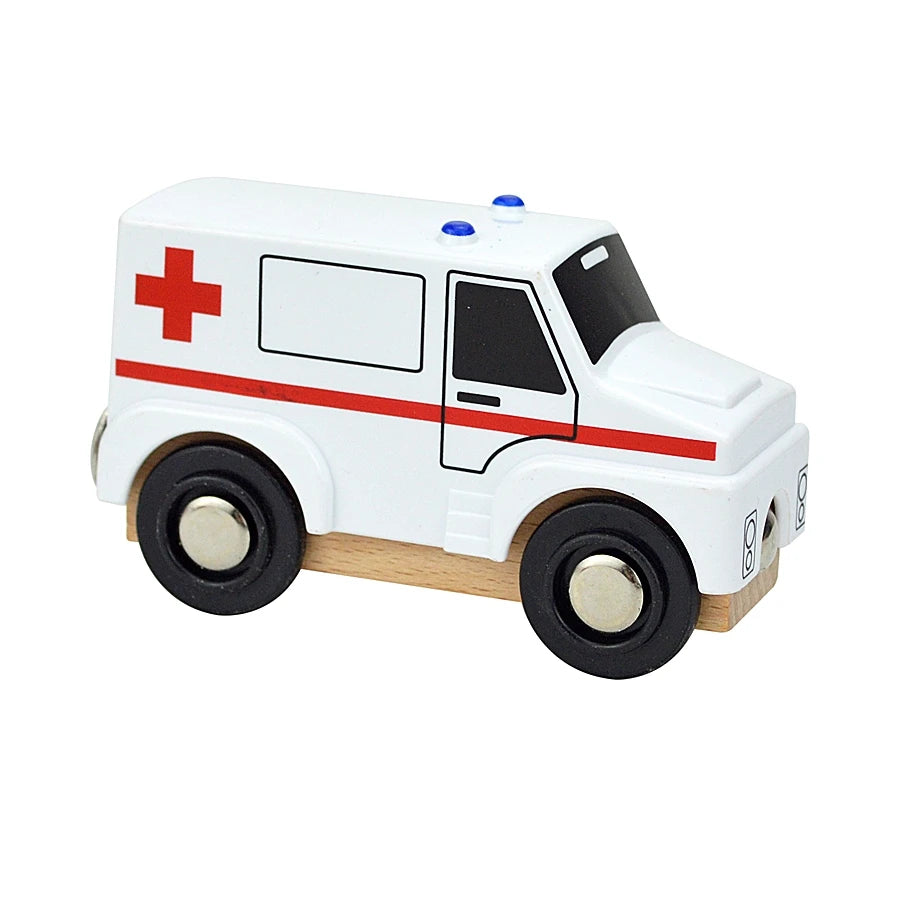 Wooden toy ambulance with red cross on a white background