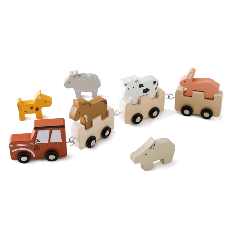 Set of wooden animal toys on a white background