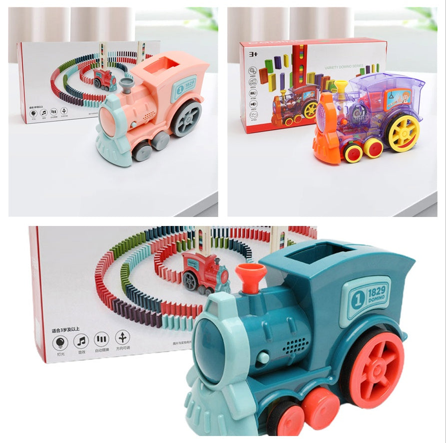 Colorful toy train set with tracks and packaging on a white surface.