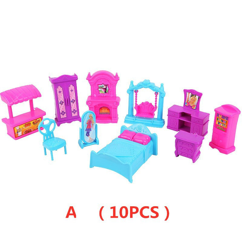 Set of colorful toy furniture pieces on a white background